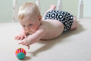 child beginning to discover movement